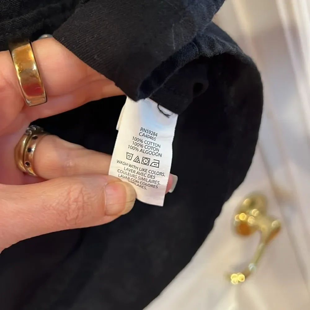 The Childrens Place youth boys size 16 black button down shirt.